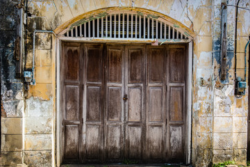 Fototapeta na wymiar Wooden door of Old building in old town Chantaburi, Thailand. useful for travel destination.