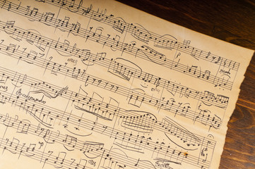 Yellowed from time sheet music notation. Manuscript