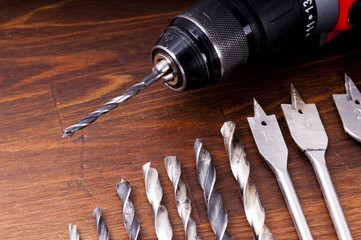 The old drill and drill on the table