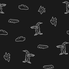 Seamless black and white kids tribal vector pattern with penguins and ice floes.