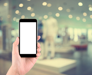 abstract blurred clothes shop in the shopping mall background with bokeh