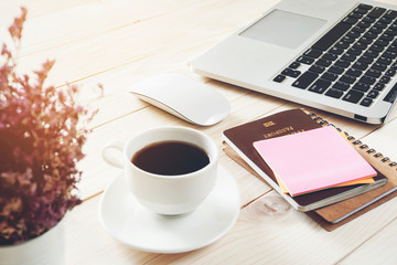 office desk with laptop, accessory on desk and business office background.