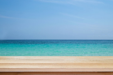 Wood floor scene of beautiful blue sky over sea beach. Summer holiday relax background with copy space for decorate design.
