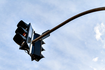 Traffic light against a clear blue sky