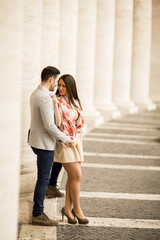 Loving couple at the St. Peter's Square in Vatican