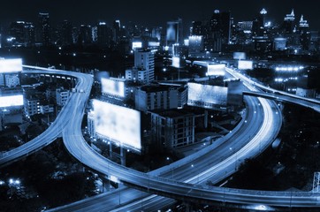 top view of Bangkok city night for background, Thailand with blue tone.