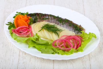 Herring with potato and onion
