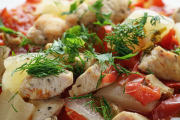 braised chicken fillet with squash and bell pepper, closeup photo