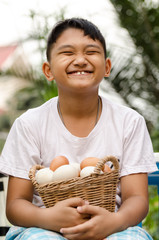 The smile of a child get eggs © cossmix