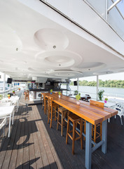 outdoor river restaurant on boat . beautiful patio