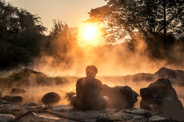 Morning fog over hot spring at Chae Sorn National Park, Thailand