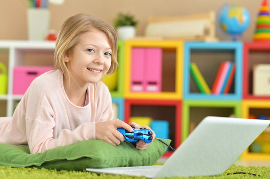 Girl is playing a computer game