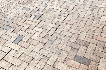 Yellow gray cobblestone pavement, texture