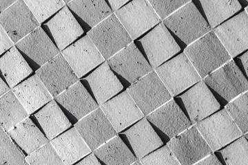 Gray concrete wall with square pattern