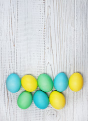 Colored eggs on a white background. Concept Happy Easter.