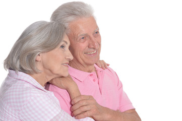 Happy elderly couple embracing