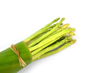 Fresh green asparagus isolated on white background