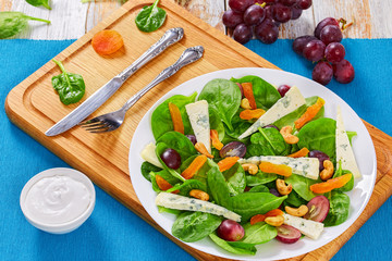 grape, blue cheese, spinach, dried apricots salad