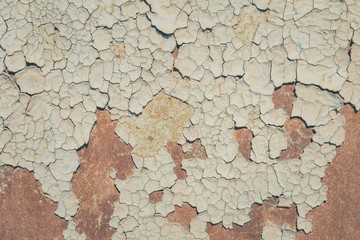 Abstract corroded colorful rusty metal background. Blue paint flaking and cracking texture on rusty metal.