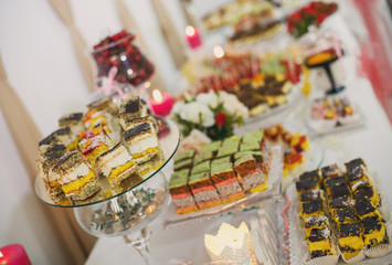 Different kinds of baked sweets on a buffet