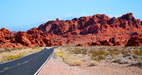 Car on road through the Valley of Fire State Park