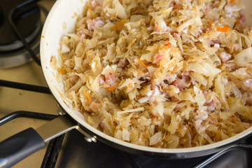 Cast-iron pan with braised cabbage