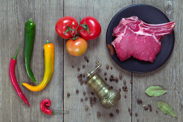 tomatoes, chili peppers, spices and a piece of beef