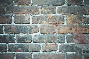 Background of old red brick wall pattern texture. Macro shot.