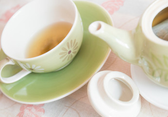 Cup of tea with tea pot for tea time break relaxation