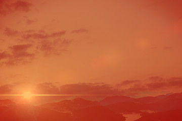 mountainous landscape covered in warm sunlight