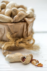 Unshelled peanuts close up