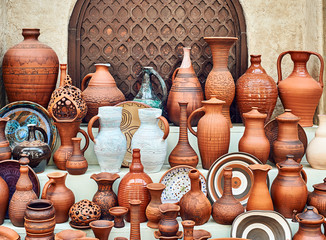 Showcase of handmade ceramic pottery in a roadside market