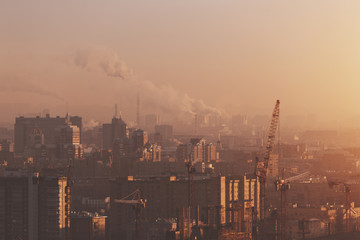 Close-up shooting from high point of morning metropolitan city: residential buildings and...