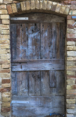 Old retro vintage exterior door in old building
