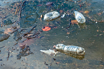 Waste floating on water surface
