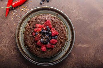 Brownies cake with chilli and berries