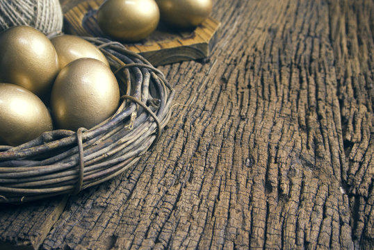 gold eggs still life with wood