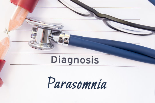 Diagnosis Parasomnia. Psychiatric diagnosis Parasomnia is written on paper, on which lay stethoscope and hourglass for measuring time to research. Concept photo for psychiatry or psychology