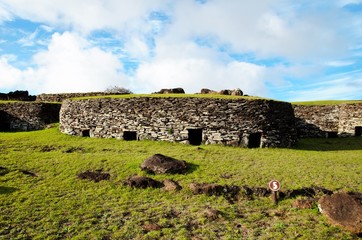 Long shot of the Orongo village between the Rano Kau crater and the Pacific ocean close to Hanga...