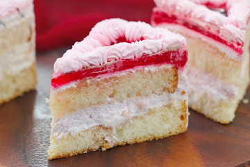 Delicious cake with cream and jelly