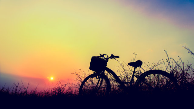 beautiful landscape image with bicycle at sunset in summer ; vintage filter style,Boost up Color Processing