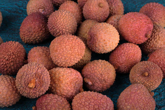 Lychee on a blue cement background