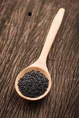 black Sesame close up shot  on wood background