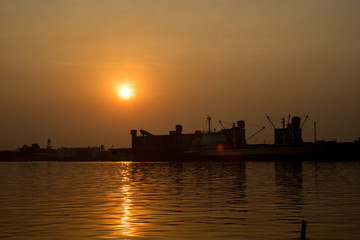 Obraz premium Yellow Morning Sunrise on River