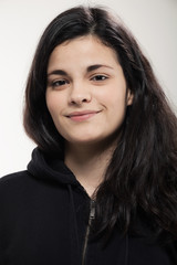 Smiling girl with a black sweatshirt
