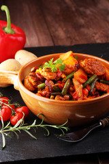 Roast meatballs, chips or roasted potatoes and vegetables