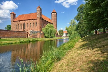 Medieval Gothic castle of the Prince-Bishop of Warmia in Lidzbark Warminski, Poland - obrazy, fototapety, plakaty