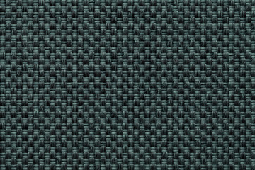 Dark green textile background with checkered pattern, closeup. Structure of the fabric macro.