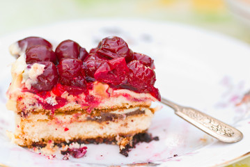 Piece of berry pie on saucer