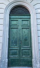 Old retro vintage exterior door in old building
